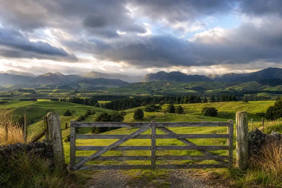 Dramatic sky over New Zealand countryside hills